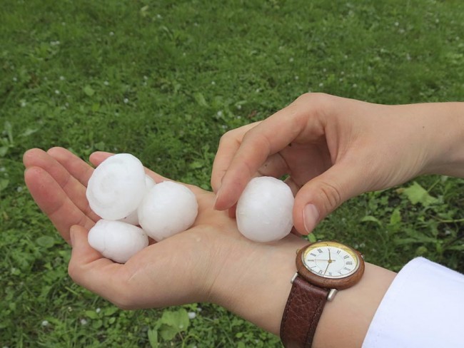 Large hailstone after storm in hand